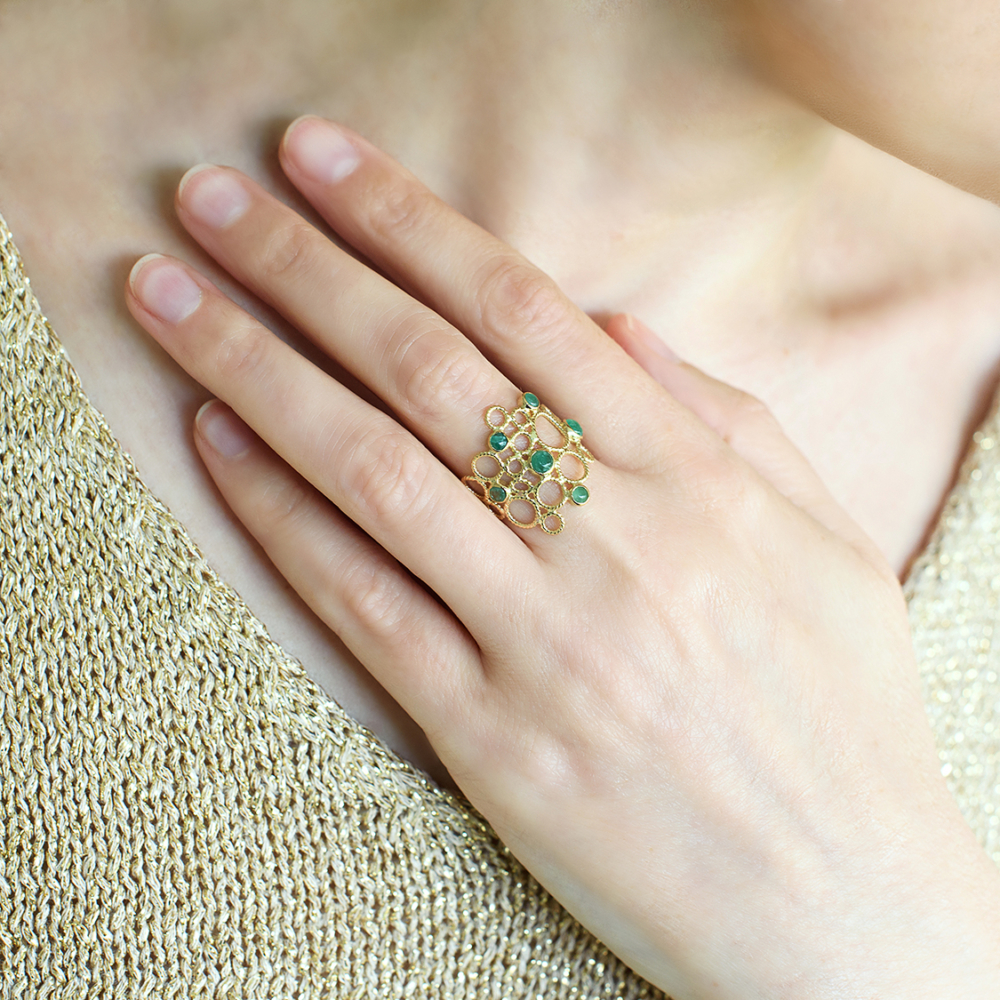Lace ring with emeralds
